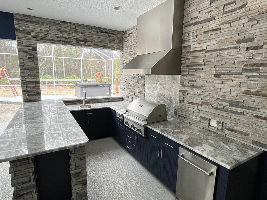 Indigo doors with a stone countertop, raised bar and stacked stone surround